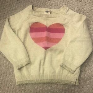 Oshkosh heart sweater. Smoke free home. Has one small stain on the right elbow.